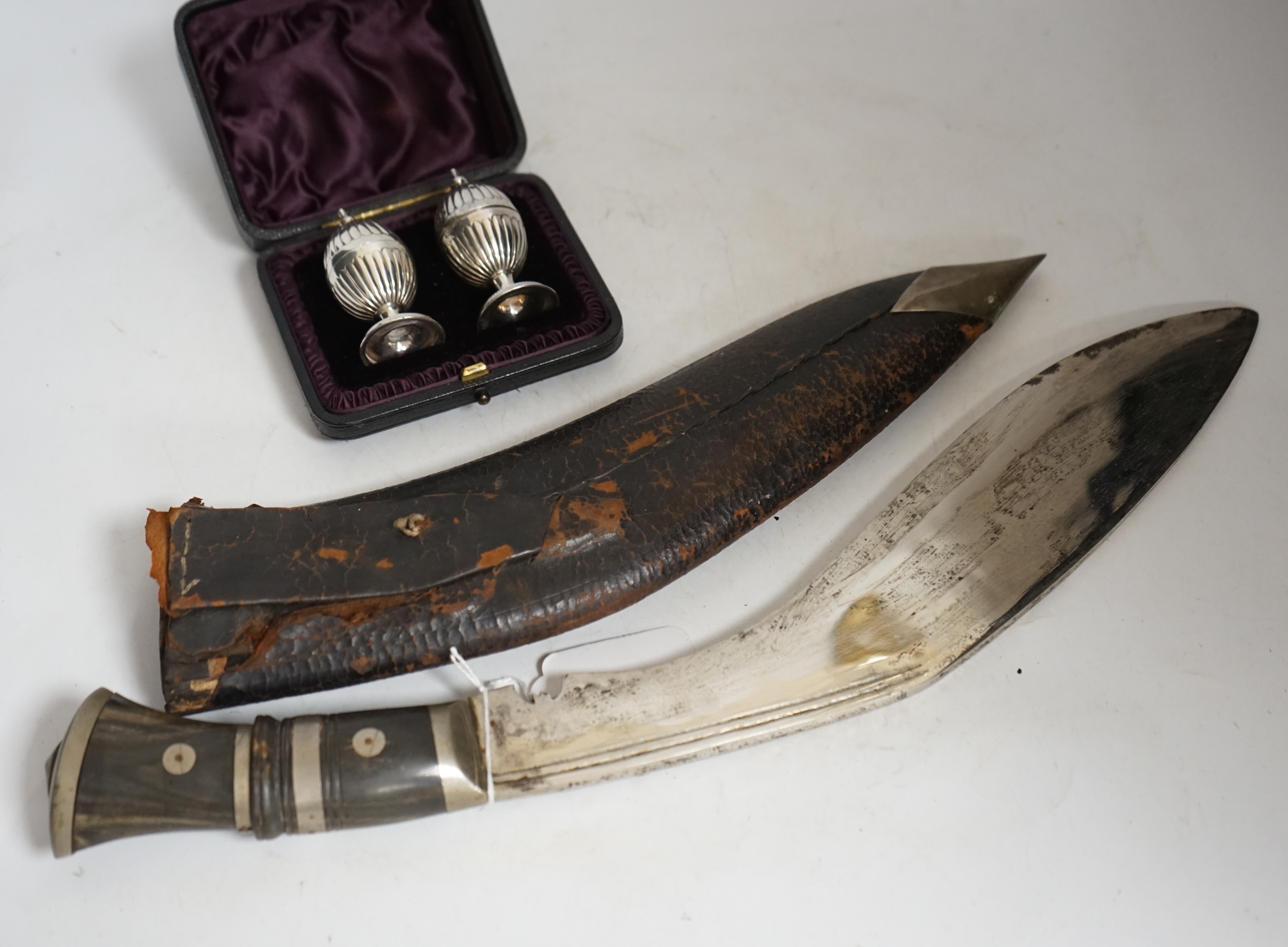 A Kukri and pair of silver peppers